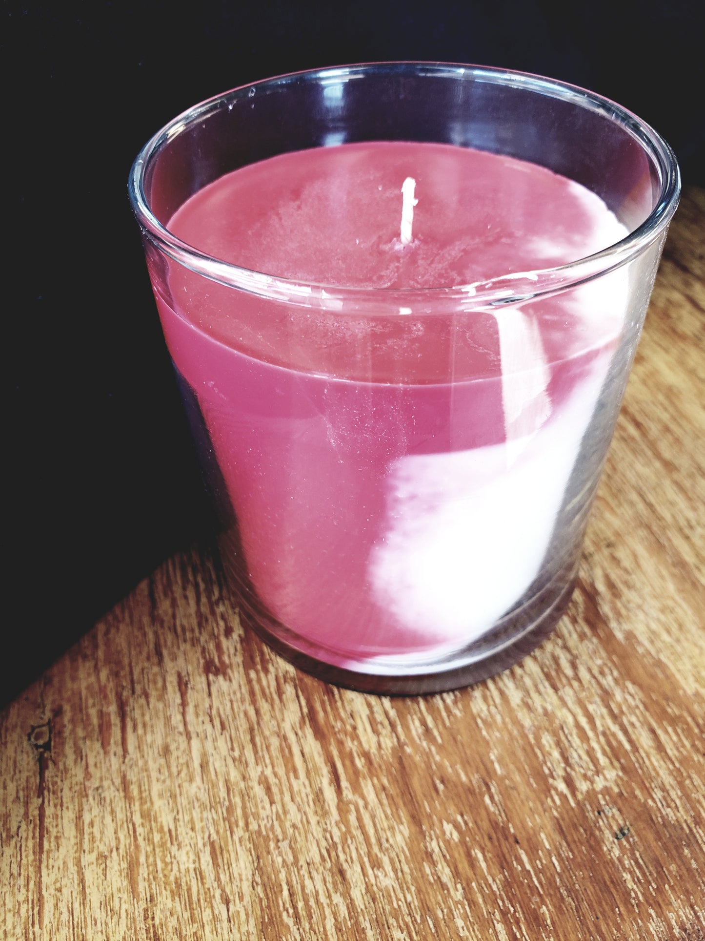 Red and White soy wax candle in a Madison candle jar