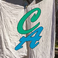 Text 'CA' in green and blue on a white pure linen background