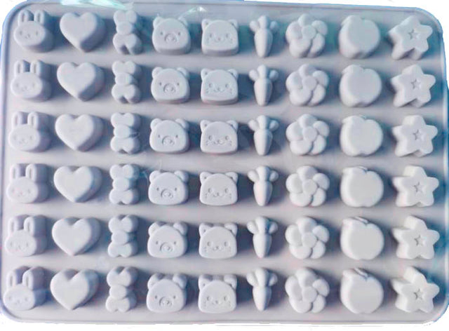 Tiny shapes silicone mold includes rabbit heart bow tie bear and carrot