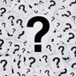 A central large black question mark on a white card, surrounded by many scattered white cards, each printed with a black question mark. Gives the idea of It's A Mystery Fragrance Oil scent.