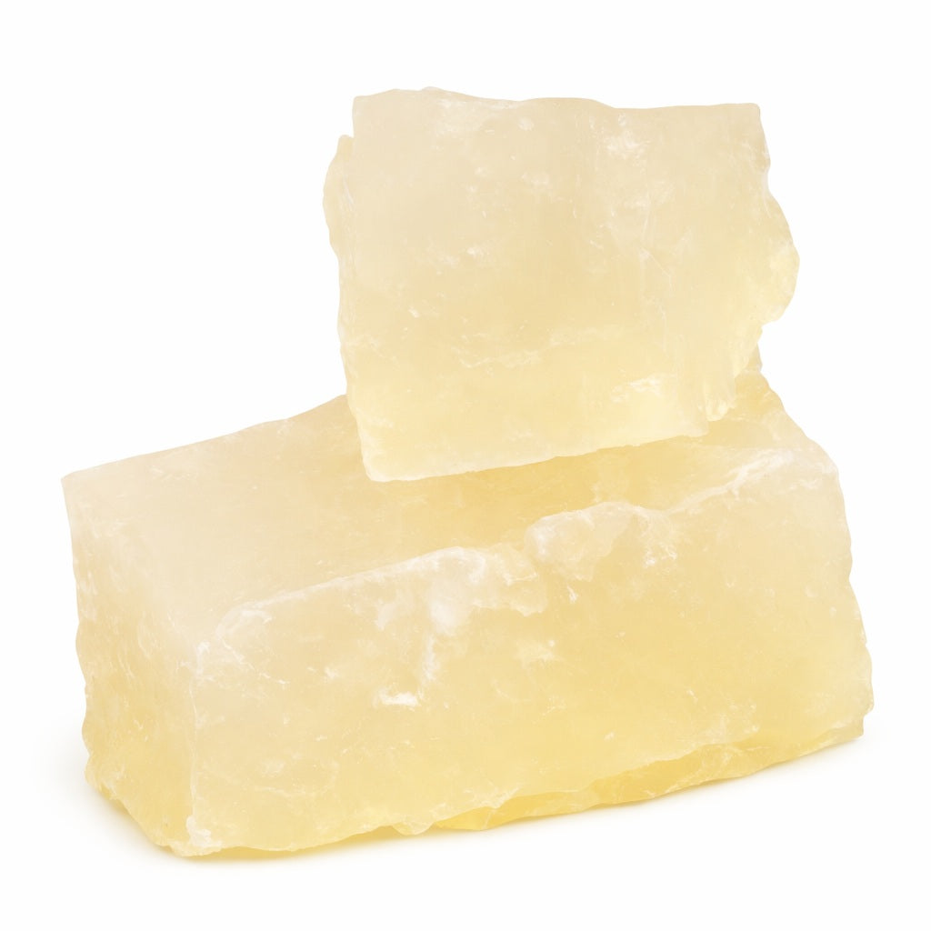 Low-sweat melt and pour soap base — two hazy translucent pale yellow blocks stacked on a white background.