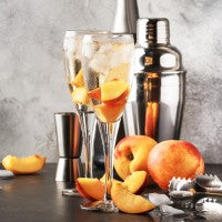 Prosecco sparkling wine and peachs