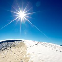 Snow on top of sand dunes 