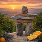 Stone man overlooking a citrus grove with sprigs of lavender and cut oranges beside him. Gives the feel for the ozone fragrance oil Stone.